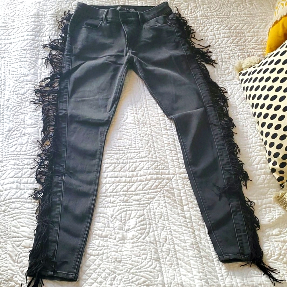 Gray skinny jeans with black fringe